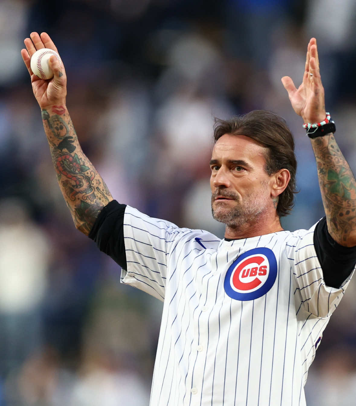 CM Punk wore a Pete Crow-Armstrong jersey for his first pitch at Wrigley Field tonight 😤