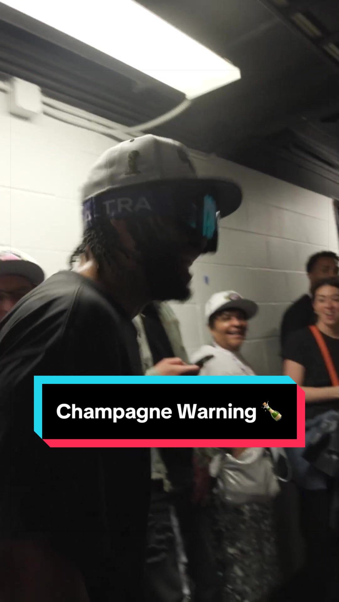 “If you guys don’t want to get champagne on you, walk away.”